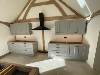 Oak truss over the new kitchen units and extractor