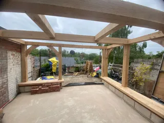 Oak flat roof beams in place before the roof went on